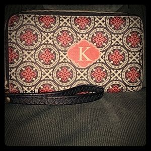 Small wristlet with the letter "k" on front